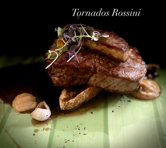 Tornados Rossini — tenderloin steak topped with foie gras, served with truffle and Madeira jus